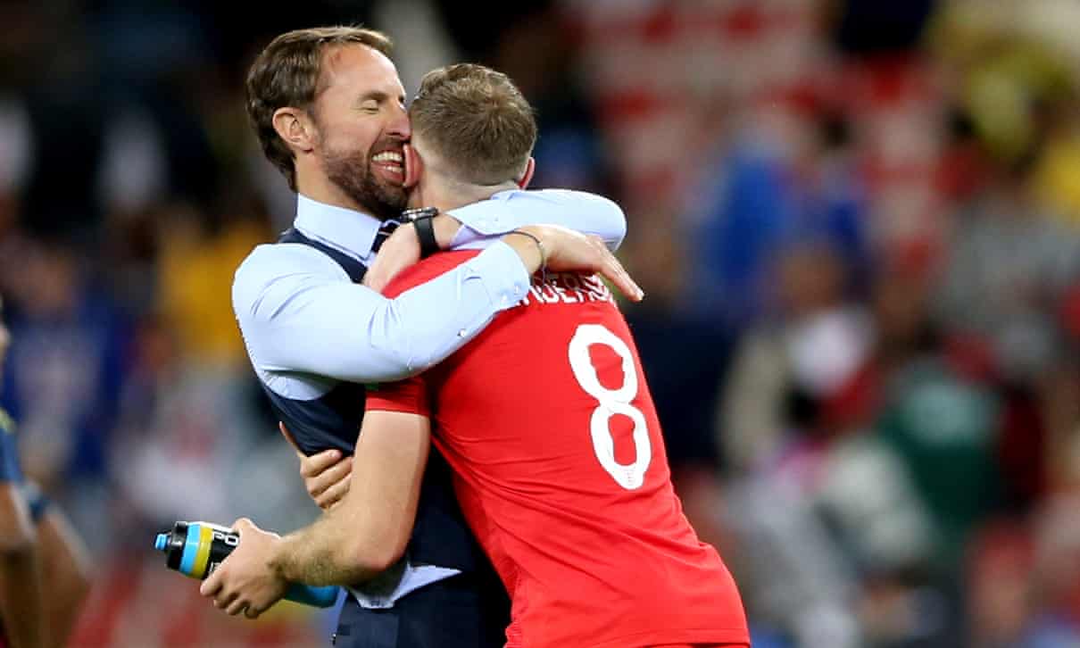 Gareth Southgate celebrates with Jordan Henderson after beating Colombia.